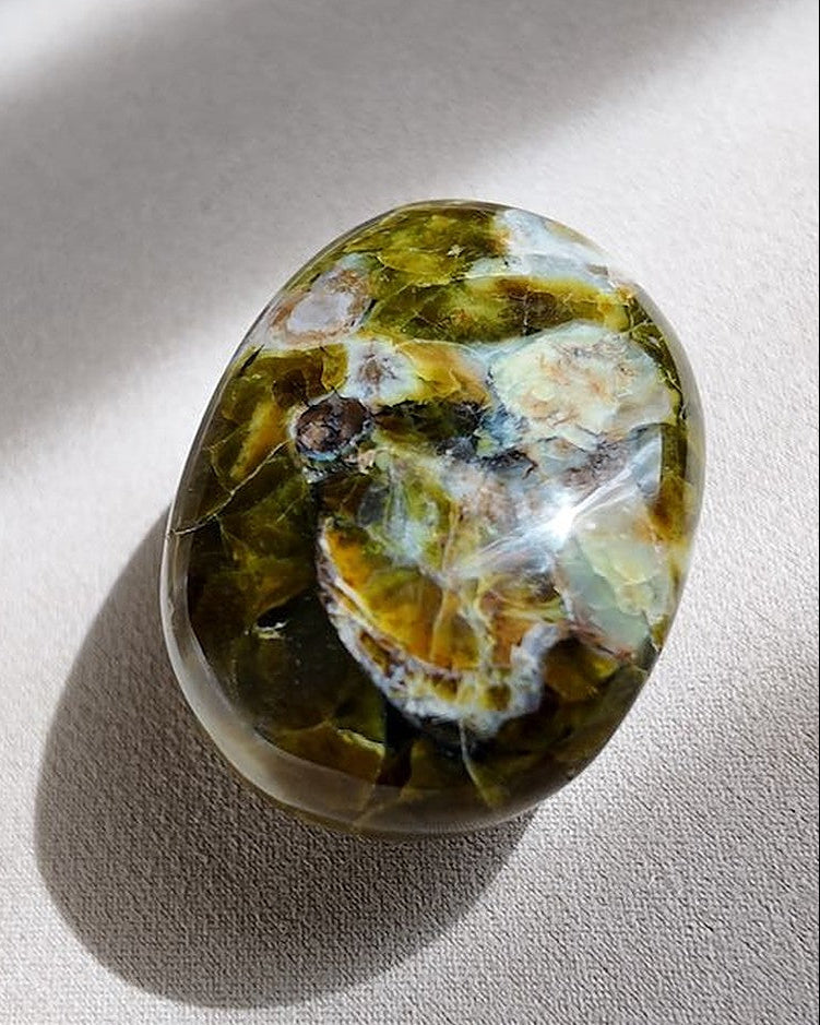 OPEN green opal palm stone on cream tray